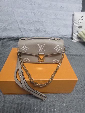 Pochette Louis Vuitton Métis East West Tourterelle