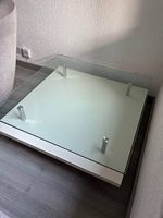 A vendre table basse avec plateau en verre
