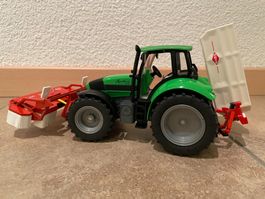 SIKU Deutz Agrotron 210 mit Kuhn Heck- und Frontmähwerk