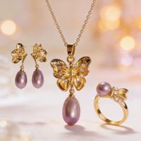Parure Perle Papillon Mauve