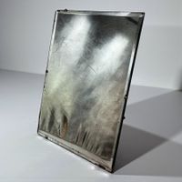 Miroir ancien verre épaisse églomisé biseauté, dos en bois