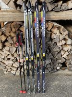 LANGLAUFSKI SALOMON 141cm + FISCHER 142cm + STÖCKE 105cm
