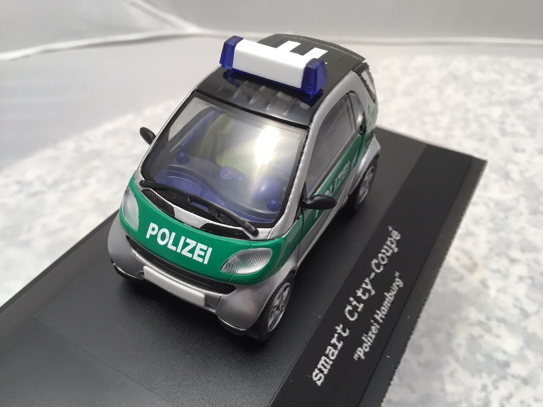 Smart Modellini d'auto: Polizei SMART – Nuovo e nell'imballaggio originale da Erlenbach im Simmental venduto da Model_box