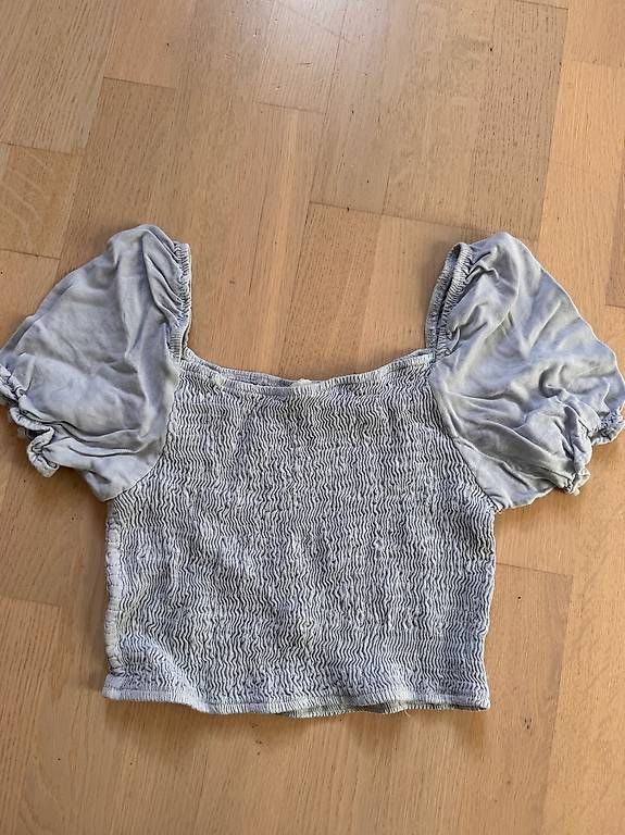 Brandy Melville T-shirt: Hellblaues Brandy Melville Oberteil – Nuovo (secondo la descrizione) da Arlesheim venduto da dan_vv9f