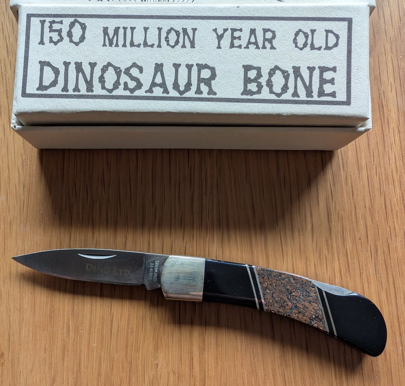 Coltelli tascabile: Taschenmesser mit Dinosaurierknochen im Schaft – Nuovo (secondo la descrizione) da Uster venduto da proshka74