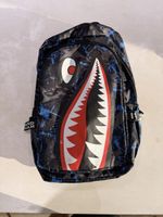 Sac à dos Sprayground Shark – Noir/Bleu – Bon état