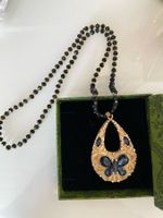 Elegante Halskette mit blauem Schmetterling Anhänger