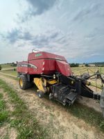 Quaderballenpresse New Holland BB 940 AP mit Vorbauhacker