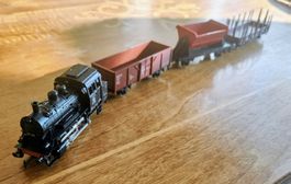 Märklin HO Tenderlok mit mit Deltamodul und 3 Güterwagen,