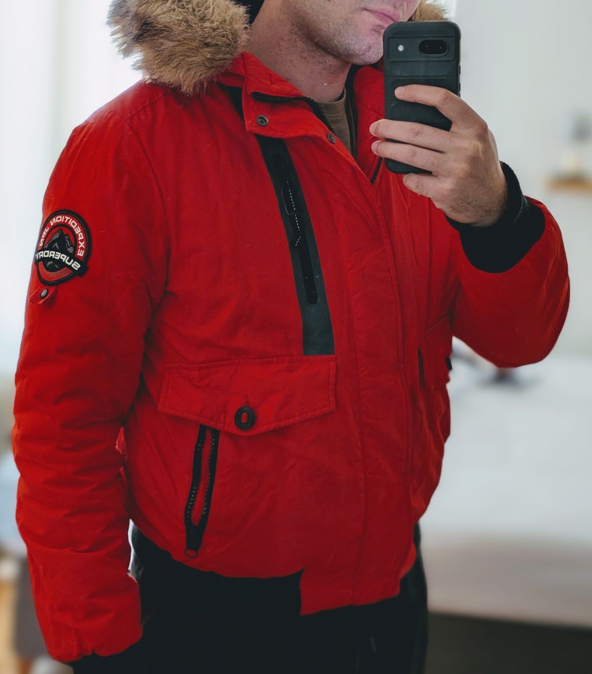 Superdry Jacken: Superdry® Winterjacke, Orange-Rot/Schwarz – Gebraucht aus Dagmersellen von Koenigsegg1 2