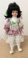 Poupée en porcelaine 