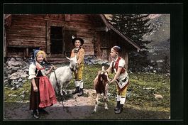 Drei Kinder in Appenzeller-Trachten mit 