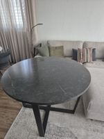 Round grey marble effect table top