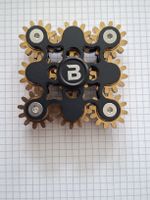 Fidget Spinner Zahnrad Design Metall schwarz gold