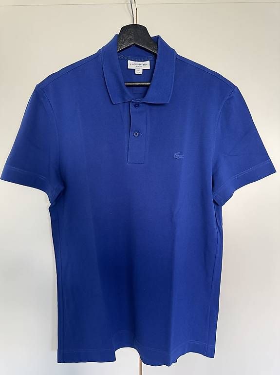 Magliette Polo: Lacoste Poloshirt (blau)  – Usato da Rothrist venduto da Baggio19