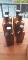 9 vecchi contenitori da farmacia