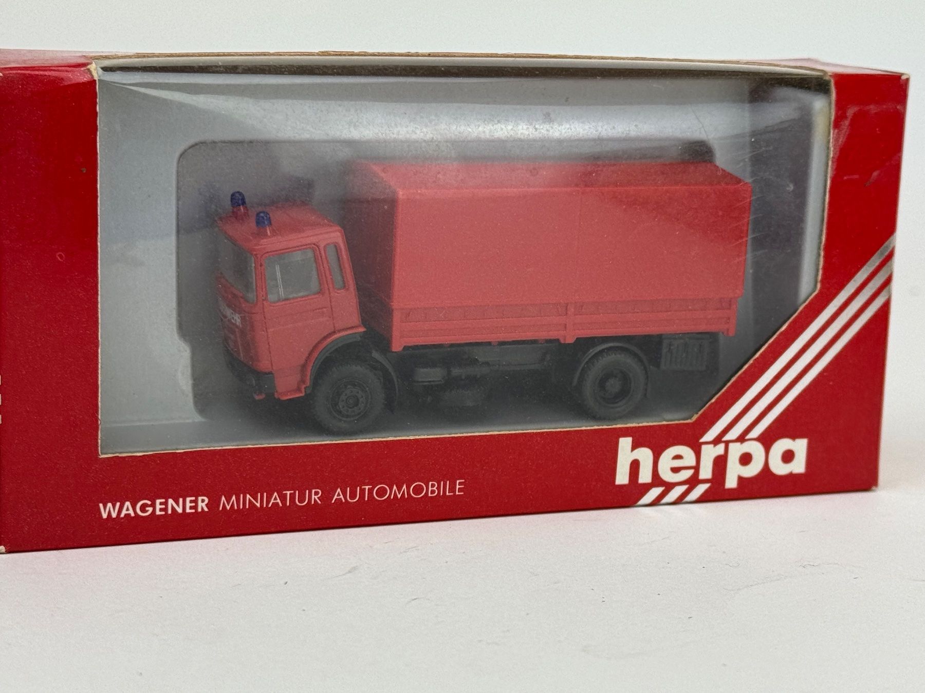 Brekina Modellini d'auto: GB5- Herpa MAN Feuerwehr Pritsche – Usato da Elm venduto da Wikmtz