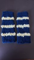 Schöne handgestrickte Pulswärmer