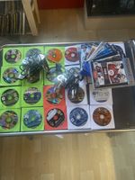 32 PS 2 Spiele und 2 Controller 