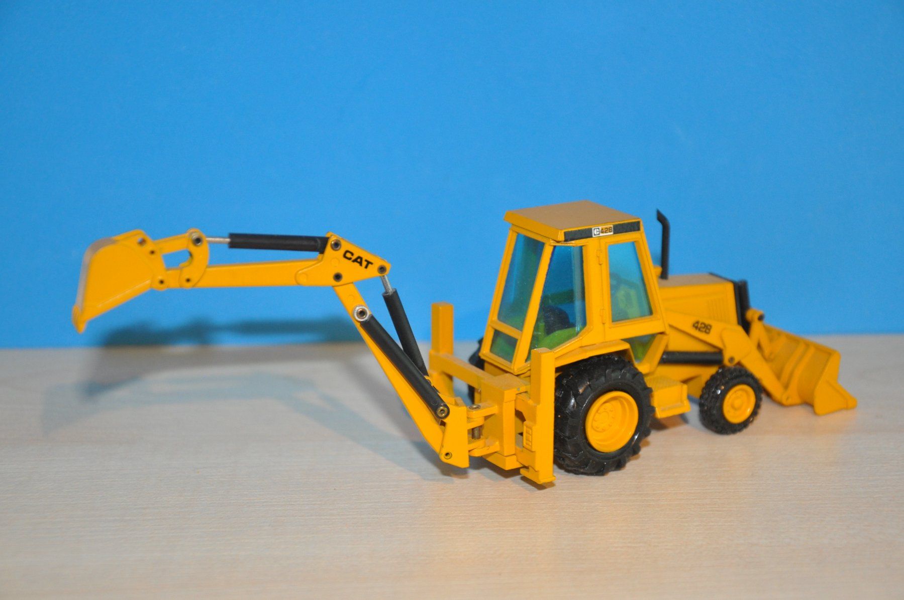 Caterpillar Kits de montage: CAT 428 Baggerlader – D'occasion à Mitlödi par worker04 2