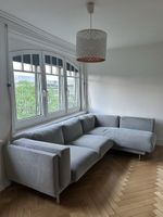 Graues Ecksofa
