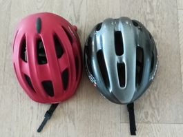 2x Bicycle Helmets Alpina & Stoke, one red and one grey
