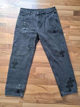 Coole Schwarze Jeans mit Kreuzen, neuwertig, Jeansgrösse 36