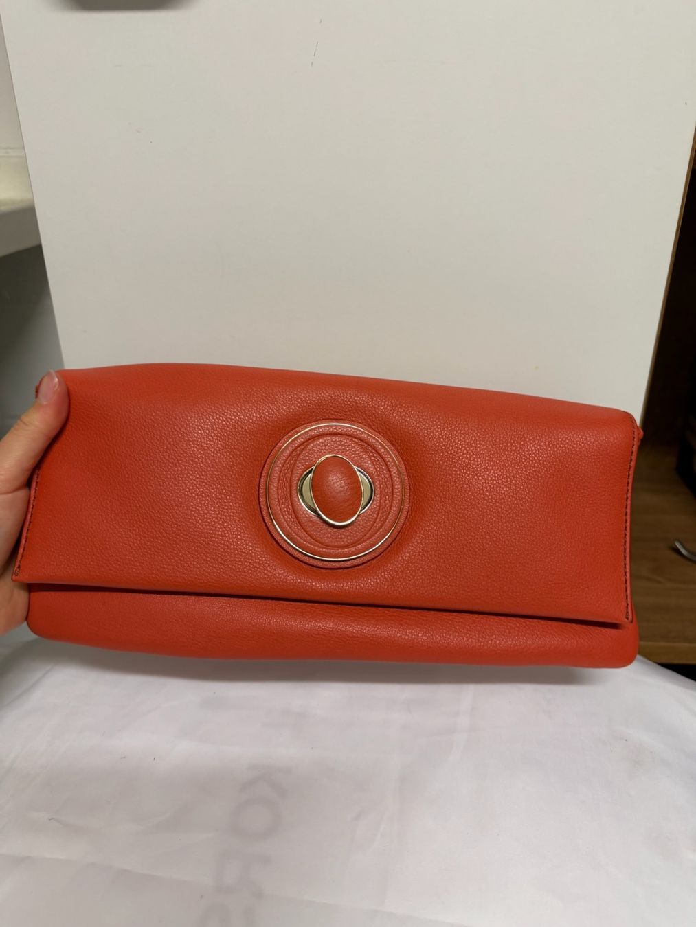 Taschen für Damen: Clutch Tasche Leder Orange Oroton – Gebraucht aus Herrliberg von jun_rl8h