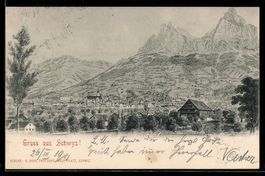 AK Schwyz, Ortsansicht mit Kirche und Bergkulisse