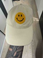 Kappe beige mit Smiley Motiv Grösse One Size guter Zustand