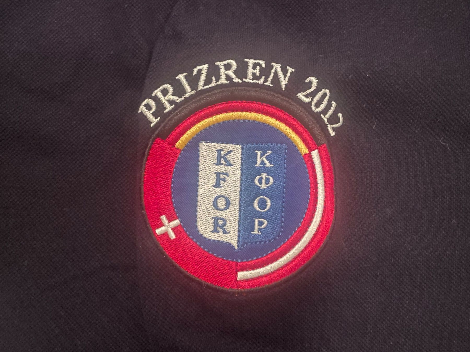Uniformi: Armee Polo Shirt "Prizren 2012" – Usato da Wila venduto da Lokelo 1