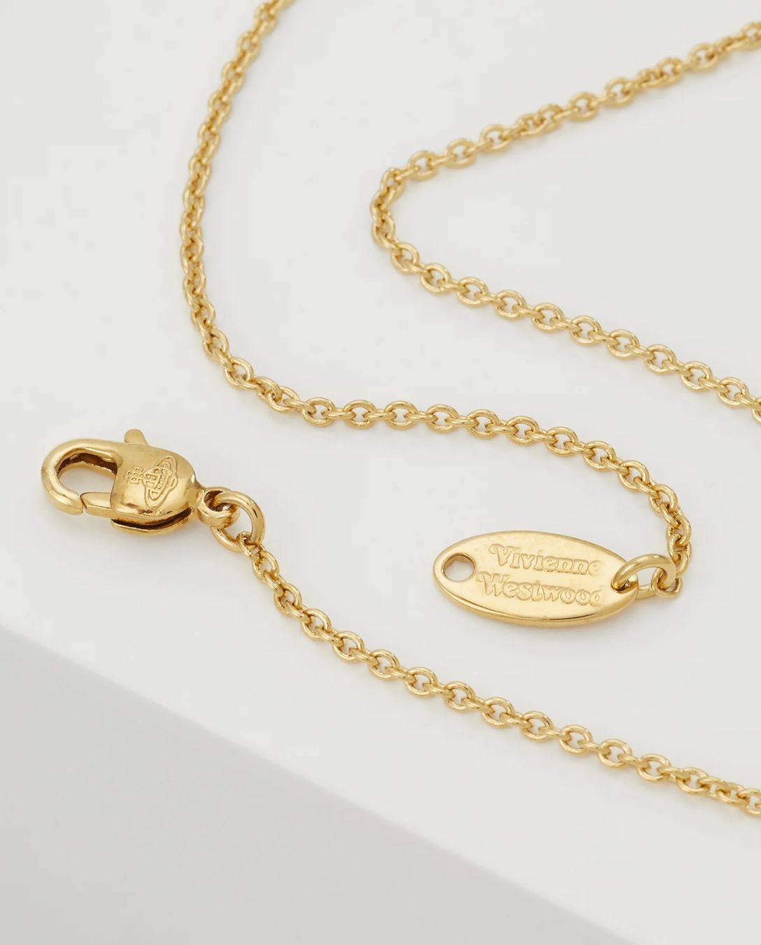 Catenine: Vivienne Westwood THIN LINES FLAT ORB PENDANT - HALSKETTE – Nuovo e nell'imballaggio originale da Oberaach venduto da Dandy2021 2
