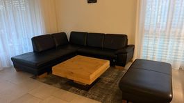 Echtleder Sofa Schwarz, sehr bequem, mit Hocker mit Stauraum