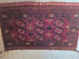 Orientteppich rot mit geometrischem Muster handarbeit
