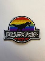 A Collé réparer Jurassic Pride motif dinosaure arc-en-ciel