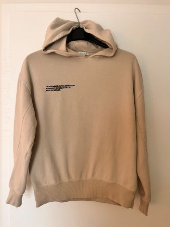 Sweat à capuche New Yorker beige unisexe XS. Tres bon état