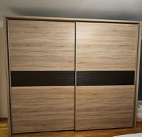 Schwebetürenschrank Holz-Optik mit dunkelbrauner Dekorfläche