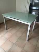 Table à manger en verre avec rallonges