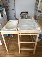 Changing table with built-in bath