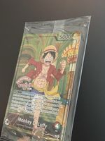 Carte promo One Piece du Musée Grévin (Luffy OP13-001)