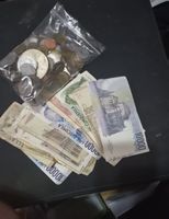 Sammlung aus Münzen und Banknoten