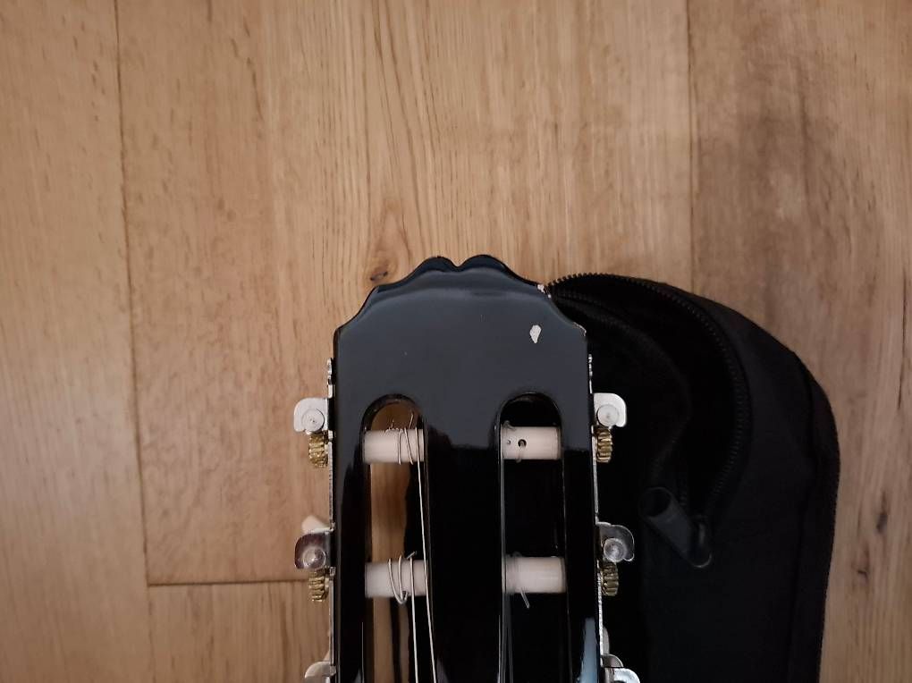 Musikinstrumente: Gitarre 1/4 – Gebraucht aus Halten von Mutzji 3