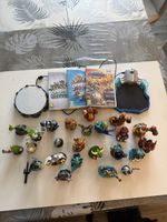 Lot 24 figurines Skylanders, 3 jeux Wii et plateformes