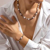 HERRENKETTE UND ARMBAND SET SURFER BRAUN SCHWARZ WEISS TON