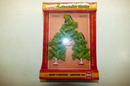 Busch N: 3xLaubbäume h=8cm