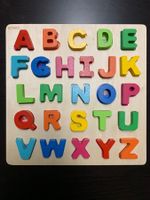 Holzpuzzle Buchstaben - auf Englisch
