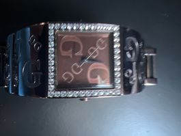 1 montre GUESS SELON PHOTOS