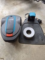 Gardena Mähroboter R100Li mit Ladestation und Netzteil