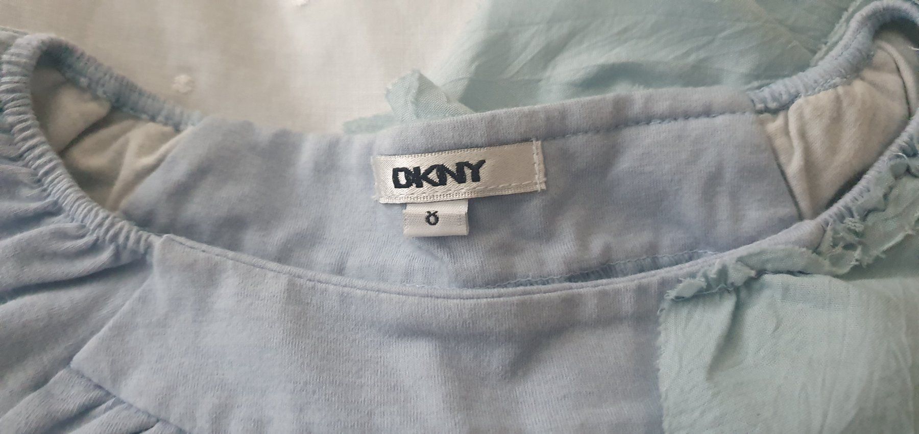 Blouses, T-shirts & Tops: Bluse/ Top von DKNY Gr 122-128 – D'occasion à Pfaffhausen par mai2002 1