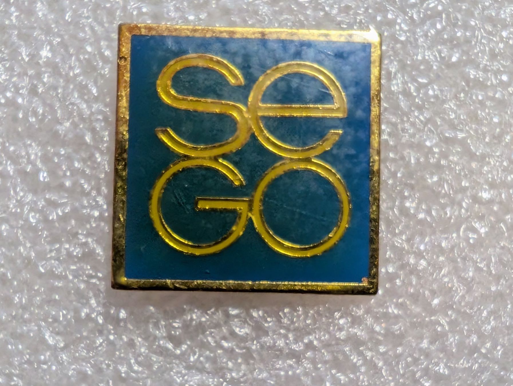 Plaketten & Abzeichen: Ansteckpin 267: Sego – Gebraucht aus Oppligen von Pin-Fall-Shop